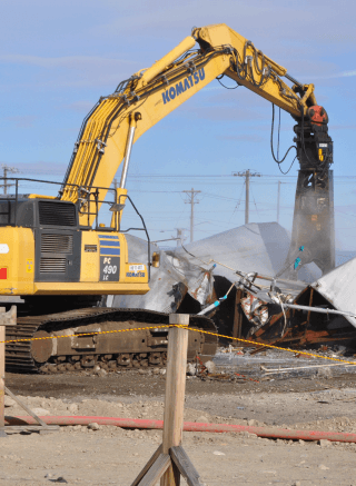 Workers performing nuclear decommissioning operations at a DOE facility